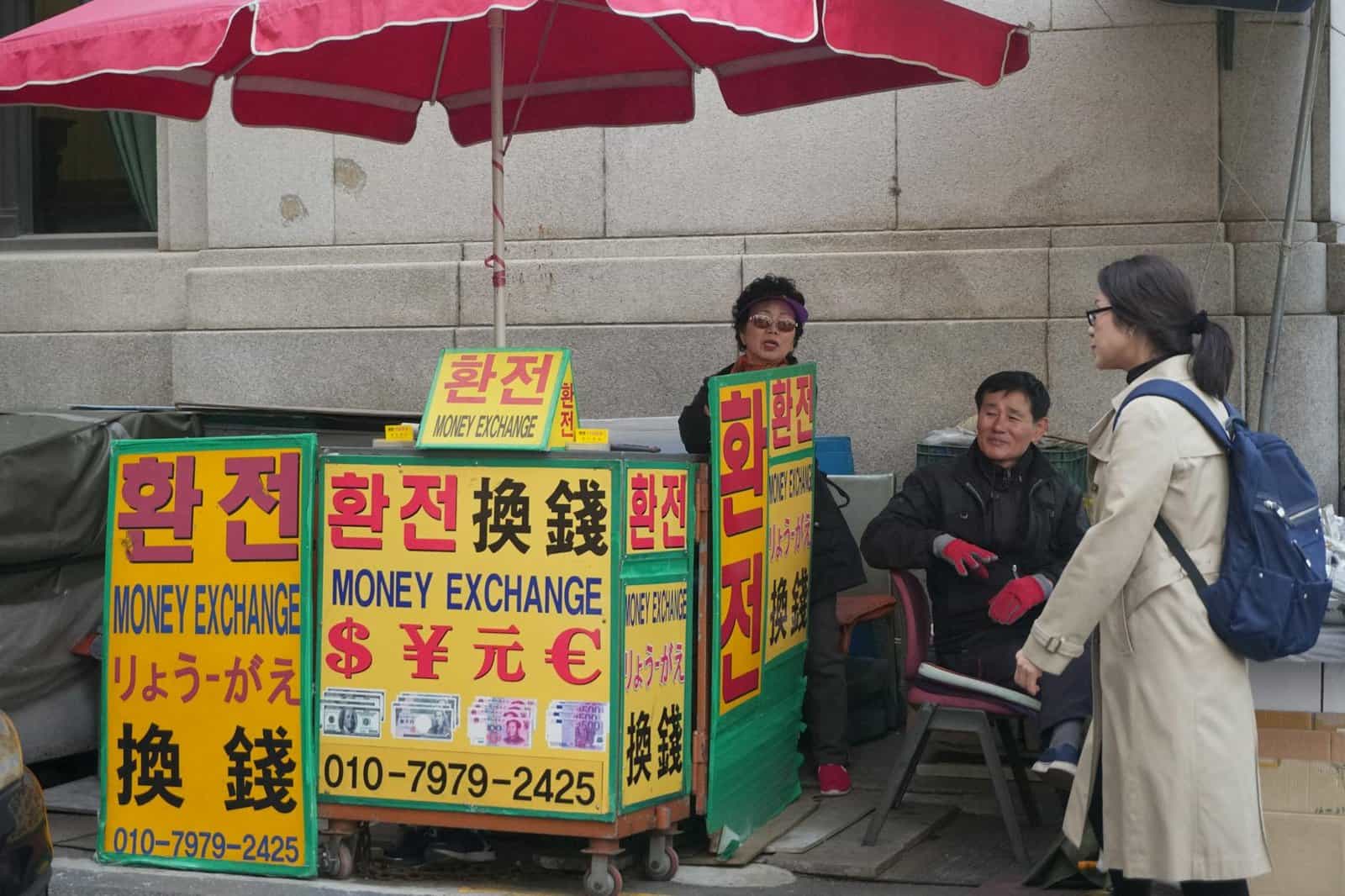 Tourist at a foreign currency exchange counter