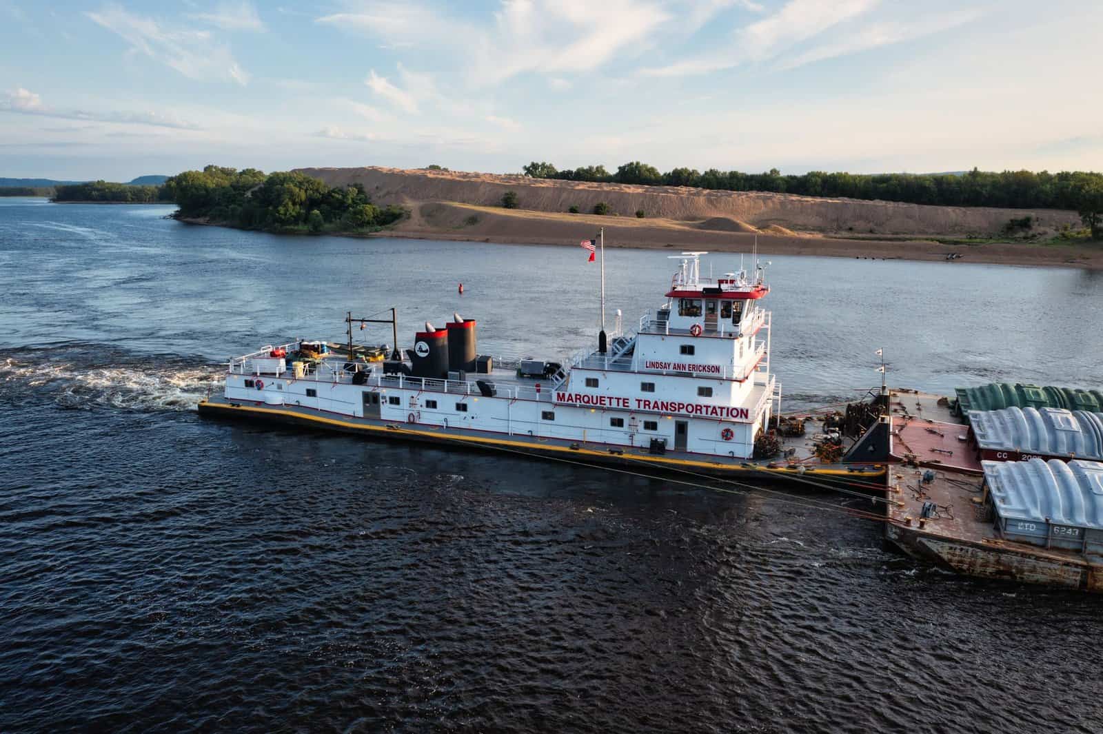 A tugboat helps transport barges on the Mississippi River near Reads Landing, MN.