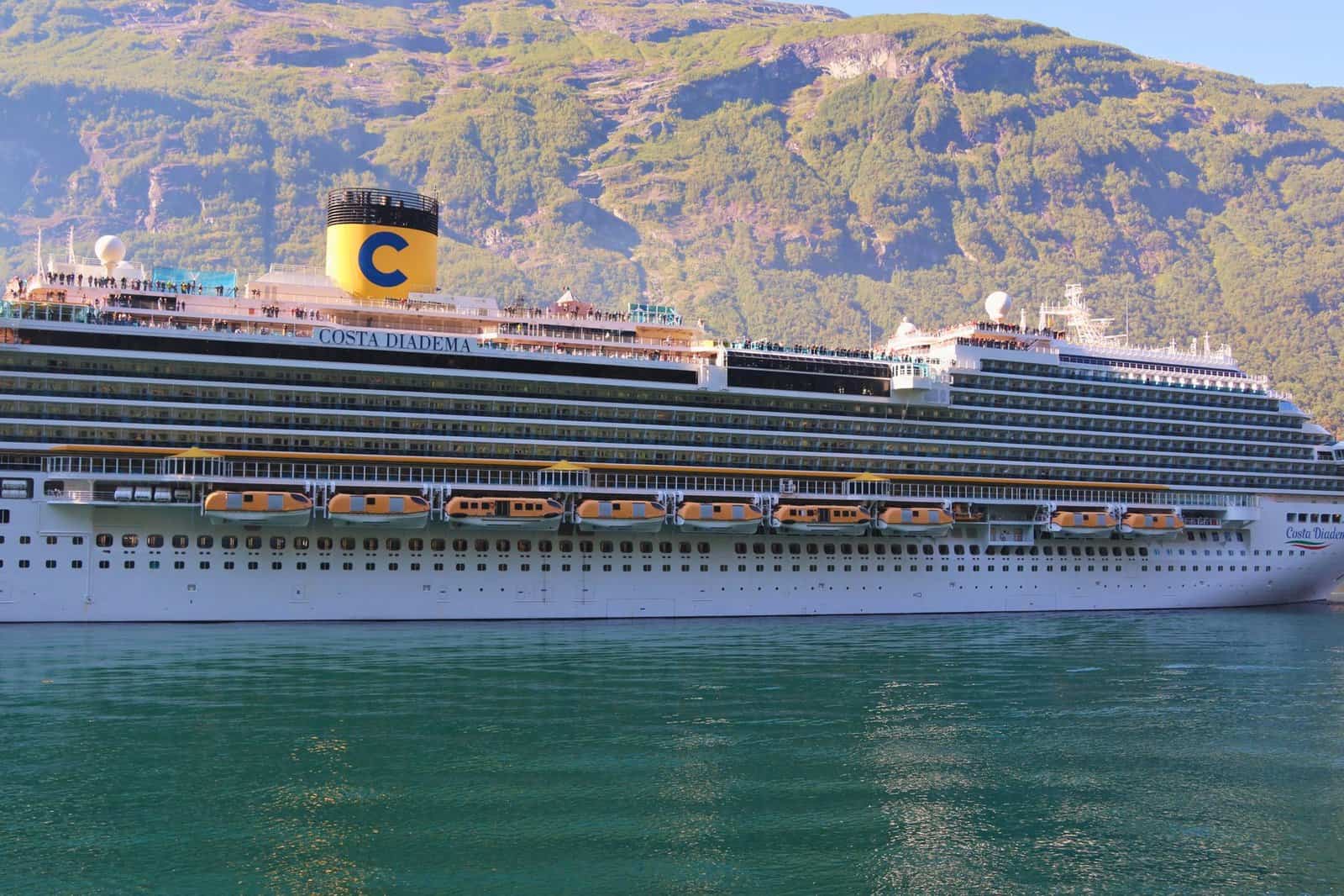 A cruise ship crossing open ocean during a repositioning voyage