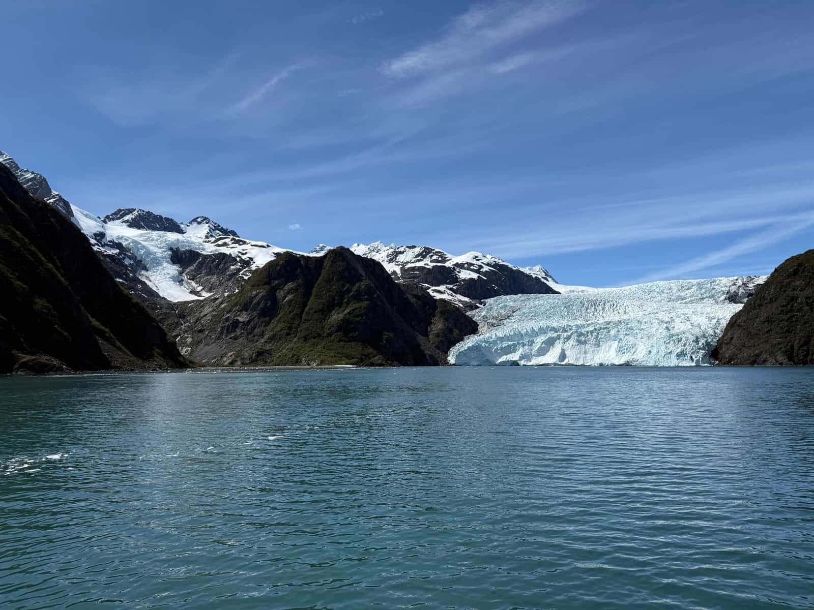 Stunning view of a glacier and icy waters in Alaska's Kenai Fjords National Park.