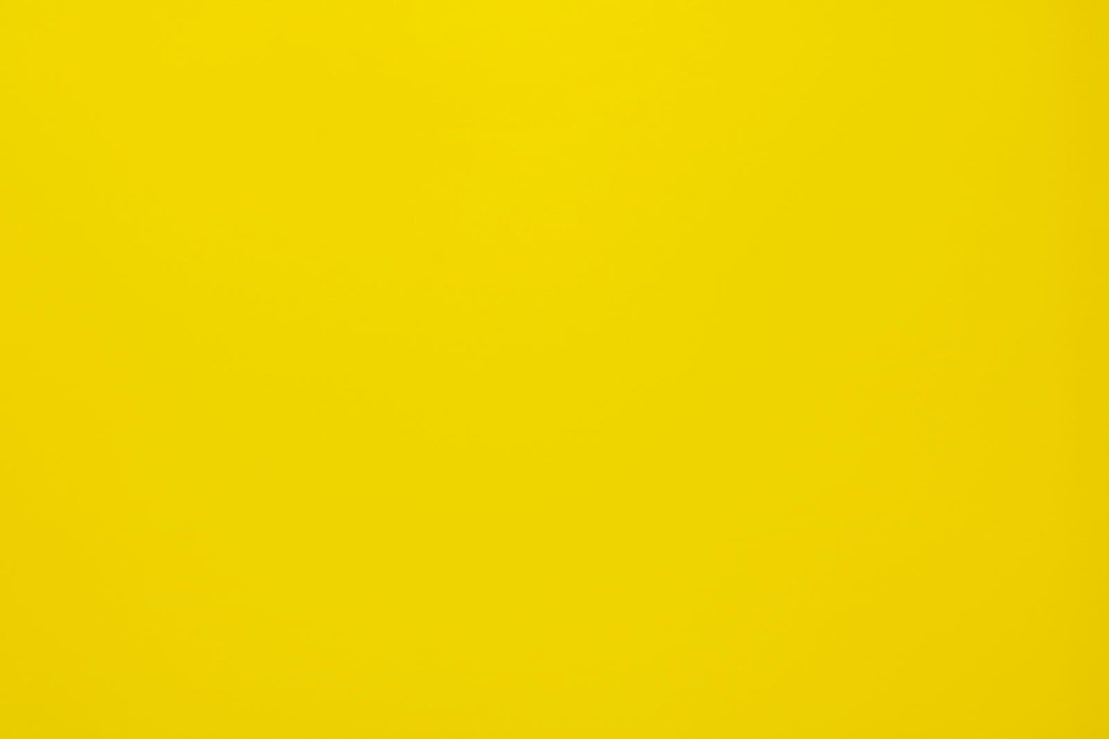 Bright yellow textured background, perfect for design projects and presentations.
