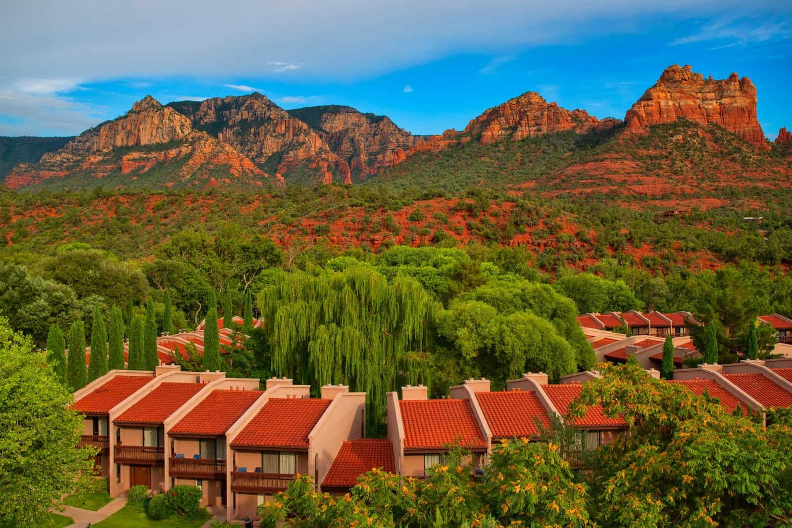 Breathtaking view of Sedona villas with iconic red rock formations in the background.
