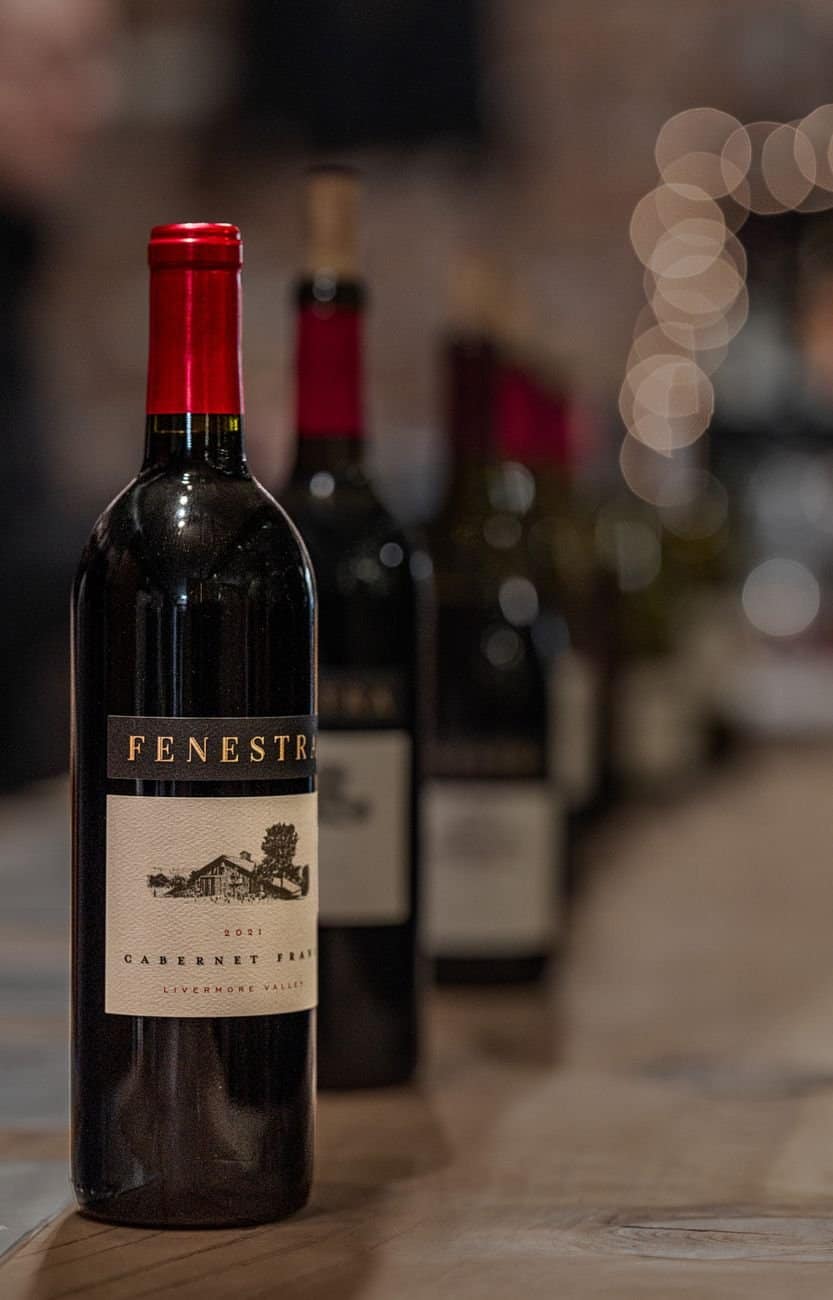 Red wine bottles in Livermore, showcasing Cabernet Franc from a local winery.