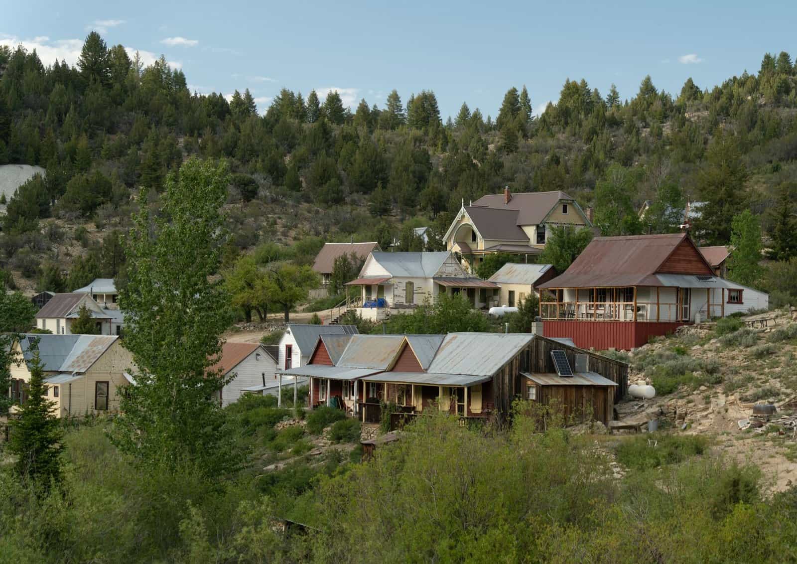 Charming view of historic Silver City, Idaho, nestled in the mountains with rustic architecture.