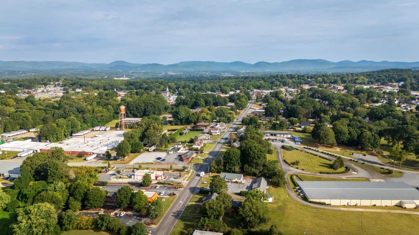 Asheville’s Neighbor Towns Got Priced Out Too — Here’s Where the Artists Actually Moved